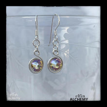 Load image into Gallery viewer, elfin alchemy stunning sculptural spiral sterling silver earrings with light golden Swarovski crystals, a design inspired by the magical art of our ancient ancestors