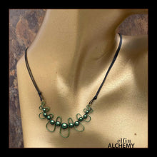 Load image into Gallery viewer, elfin alchemy emerald, verdigris and moss greens sculptural squiggle necklace with Swarovski pearls handcrafted in Lancashire