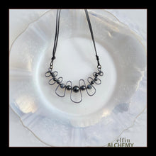 Load image into Gallery viewer, elfin alchemy sculptural squiggle necklace with metallic grey Hematine gemstone beads handcrafted in Lancashire