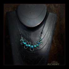 Load image into Gallery viewer, elfin alchemy sculptural squiggle necklace with dark turquoise dyed Magnesite gemstone beads handcrafted in Lancashire
