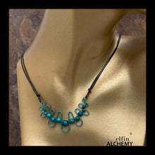 Load image into Gallery viewer, elfin alchemy sculptural squiggle necklace with dark turquoise dyed Magnesite gemstone beads handcrafted in Lancashire