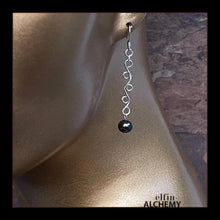 Load image into Gallery viewer, elfin alchemy sterling silver sculptural vine scroll earrings with dark grey colour cultured freshwater pearls, inspired by the magical art of our ancient ancestors, handmade in Lancashire, England