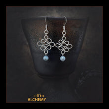 Load image into Gallery viewer, elfin alchemy sterling silver sculptural Celtic style white freshwater pearl earrings inspired by the magical art of our ancient ancestors, handmade in Lancashire, England