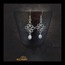 Load image into Gallery viewer, elfin alchemy sterling silver sculptural Celtic style white freshwater pearl earrings inspired by the magical art of our ancient ancestors, handmade in Lancashire, England