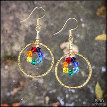 Load image into Gallery viewer, elfin alchemy gold colour sculptural hoop design rainbow colour Swarovski earrings with stunning sparkles, handmade in Lancashire, England