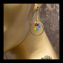 Load image into Gallery viewer, elfin alchemy gold colour textured hoop earrings with rainbow colour Swarovski crystal beads and sterling silver ear hooks, handmade in Lancashire, England