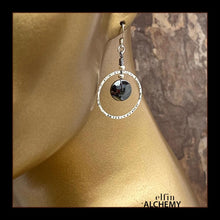 Load image into Gallery viewer, elfin alchemy silver colour textured hoop earrings with disc-shaped hematine gemstones and sterling silver ear hooks, handmade in Lancashire, England