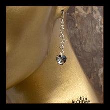 Load image into Gallery viewer, elfin alchemy sterling silver sculptural vine scroll earrings with grey-black front and green back colour Swarovski crystal hearts, inspired by the magical art of our ancient ancestors, handmade in Lancashire, England