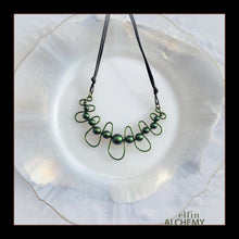 Load image into Gallery viewer, elfin alchemy emerald, verdigris and moss greens sculptural squiggle necklace with Swarovski pearls handcrafted in Lancashire
