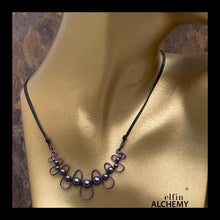Load image into Gallery viewer, elfin alchemy purple sculptural squiggle necklace with Swarovski pearls handcrafted in Lancashire

