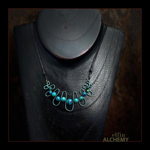elfin alchemy sculptural squiggle necklace with dark turquoise dyed Magnesite gemstone beads handcrafted in Lancashire