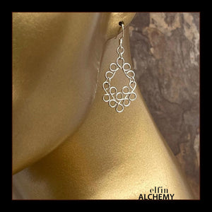 elfin alchemy sterling silver scroll style earrings inspired by the magical art of our ancient ancestors, handmade in Lancashire, England
