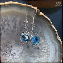 Load image into Gallery viewer, elfin alchemy stunning sculptural spiral sterling silver earrings with aquamarine Swarovski crystals, a design inspired by the magical art of our ancient ancestors

