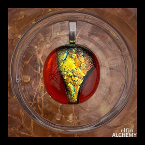 elfin alchemy coppery gold and transparent orange zing sparkles fused glass pendant, abstract glass alchemy, handmade in Lancashire, England