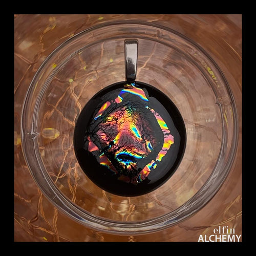 elfin alchemy coppery gold magma on black fused glass pendant, abstract glass alchemy, handmade in Lancashire, England