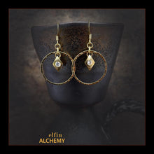 Load image into Gallery viewer, elfin alchemy gold colour sculptural hoop design Swarovski charm earrings, handmade in Lancashire, England
