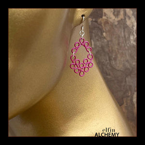 elfin alchemy bright pink sculptural scroll style earrings, inspired by the magical art of our ancient ancestors, handmade in Lancashire, England