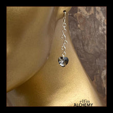 Load image into Gallery viewer, elfin alchemy sterling silver sculptural vine scroll earrings with grey-black front and green back colour Swarovski crystal hearts, inspired by the magical art of our ancient ancestors, handmade in Lancashire, England
