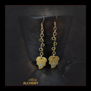 elfin alchemy gold colour leaf charms with Swarovski crystals and vine scroll wirework earrings handmade in Lancashire, England