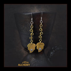 elfin alchemy gold colour leaf charms with Swarovski crystals and vine scroll wirework earrings with sterling silver hooks, handmade in Lancashire, England