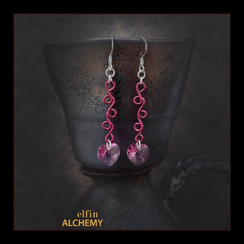 elfin alchemy magenta pink sculptural vine scroll Swarovski heart earrings inspired by the magical art of our ancient ancestors, handmade in Lancashire, England
