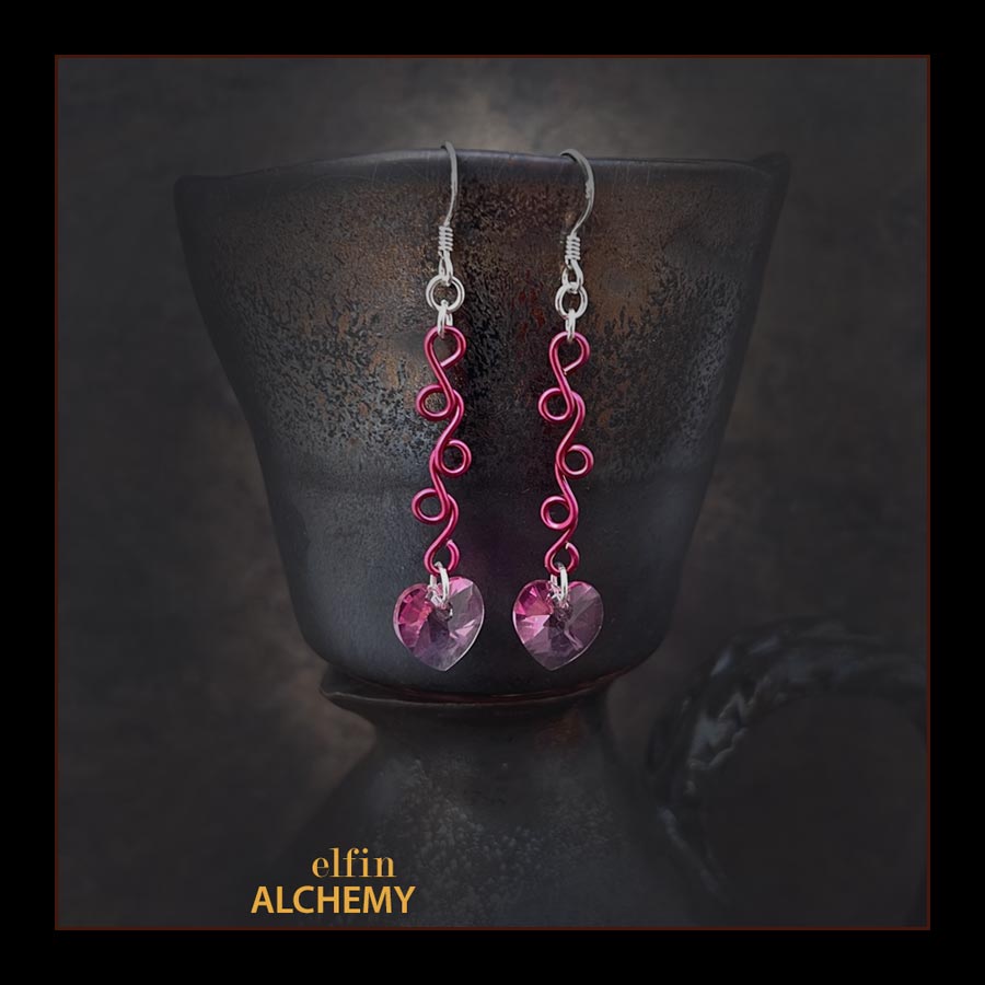 elfin alchemy magenta pink sculptural vine scroll Swarovski heart earrings inspired by the magical art of our ancient ancestors, handmade in Lancashire, England